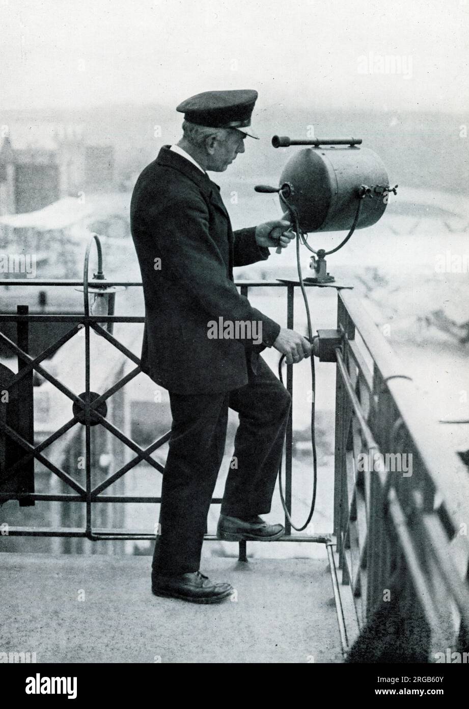 Lookout man operating signalling lamp from the Control Tower, Croydon ...