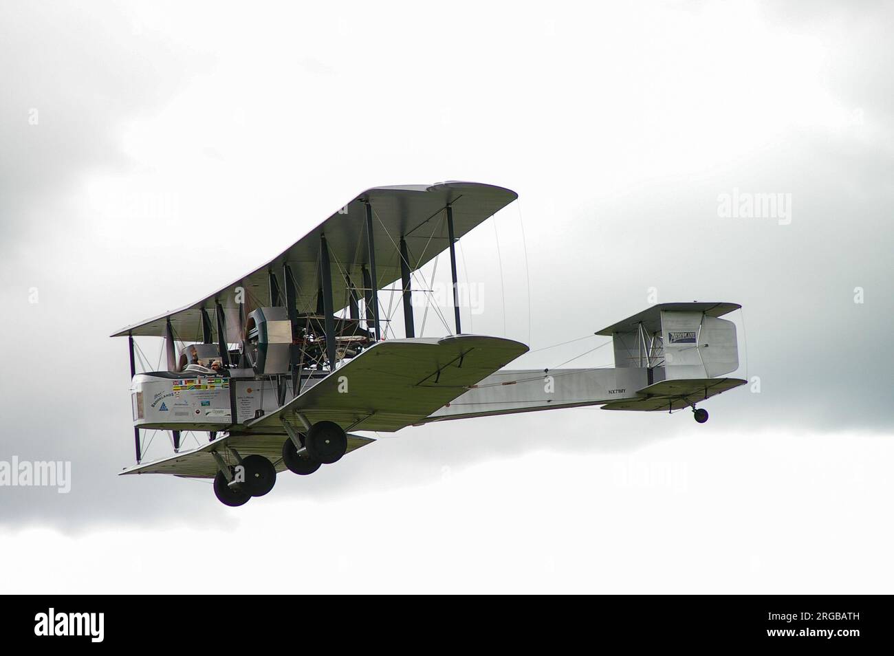 WW1 photo of a biplane in flight, coming out of clouds WW1 photo of a biplane in flight, coming out of clouds