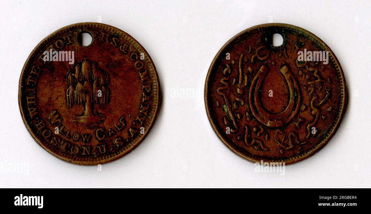 White Brothers & Company bronze coin, advertising token, Boston USA - Willow Calf, with horseshoe design and pseudo-Arabic inscriptions on the reverse. Willow Calf is a type of processed leather manufactured by the company - the token was attached to a pair of shoes as a tag (hence the hole), (back and front). Stock Photo
