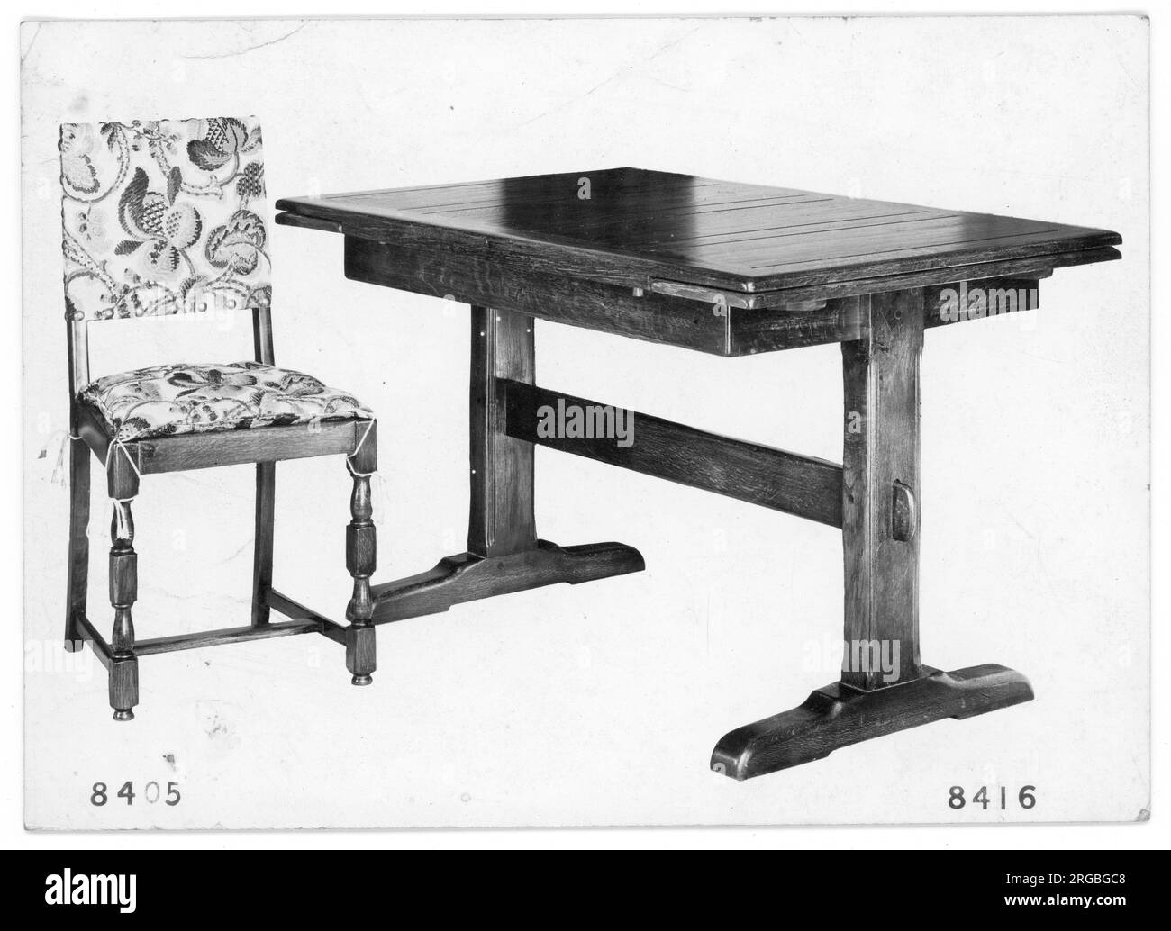 Table and chair from a furniture showroom catalogue, numbered as number 8405 and number 8416, respectively. Stock Photo