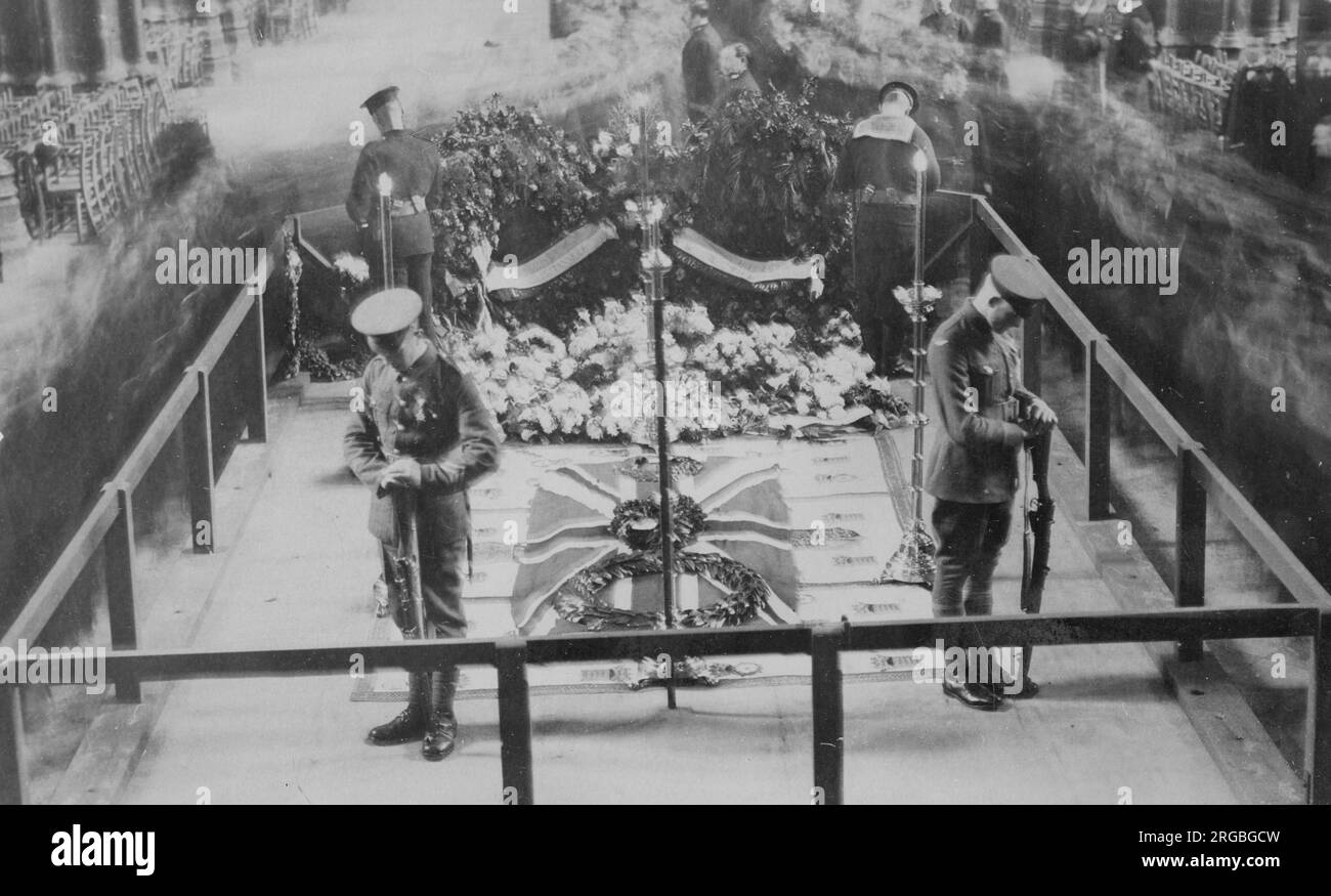 The Tomb of The Unknown Warrior, in Westminster Abbey, during the burial ceremony, with members of the public paying their respects. Stock Photo