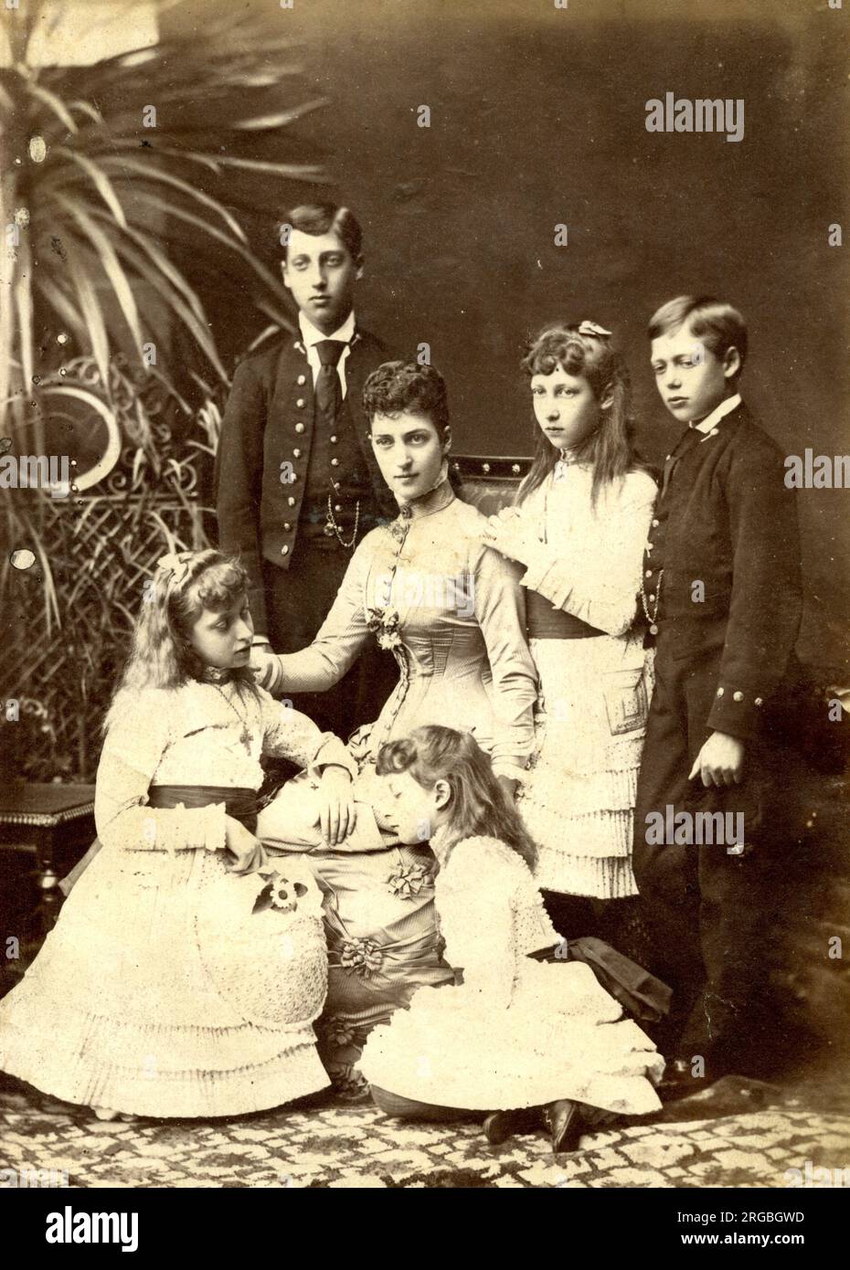 Princess Alexandra of Wales and her children (Albert, George, Louise, Victoria and Maud). Stock Photo