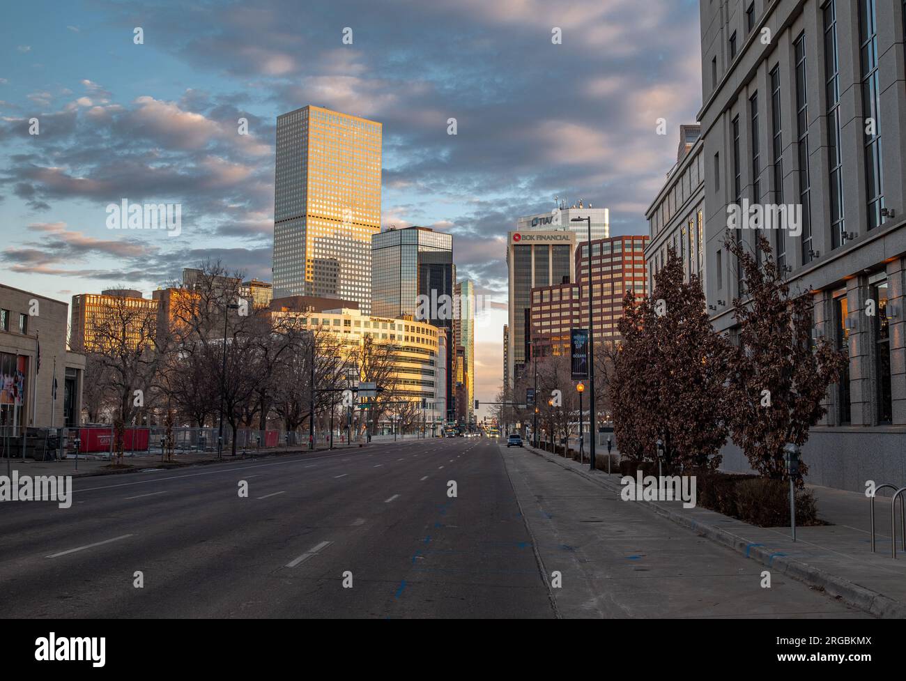 The quiet streets of downtown Denver, Colorado as the sun comes up on an early Sunday morning. Stock Photo