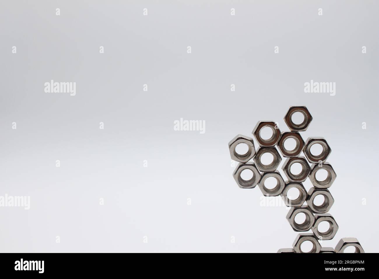 Many nuts touching each other with white background and text area Stock Photo