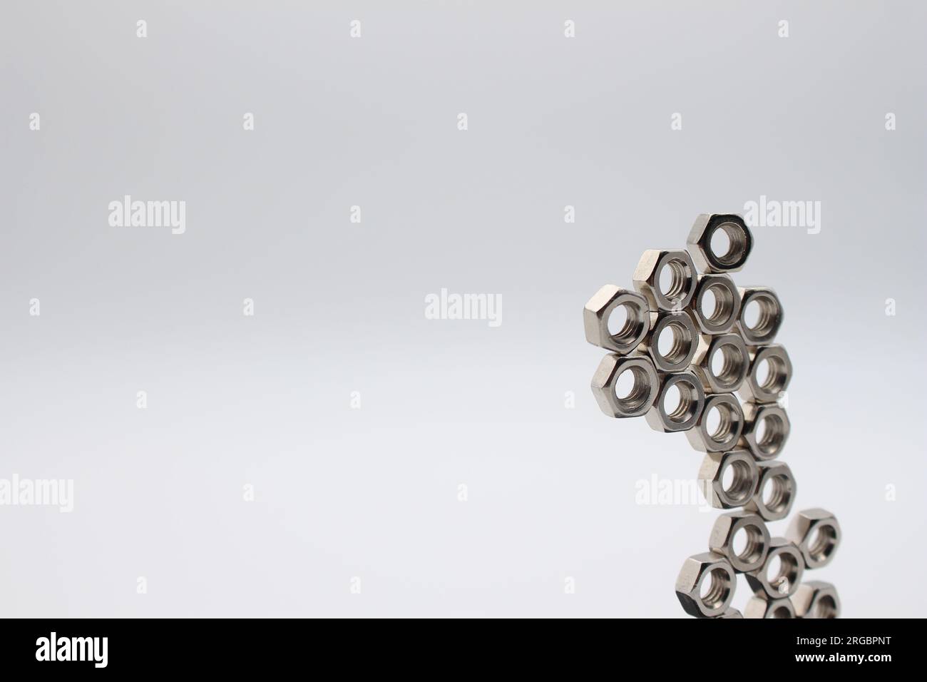 Many nuts touching each other with white background and text area Stock Photo