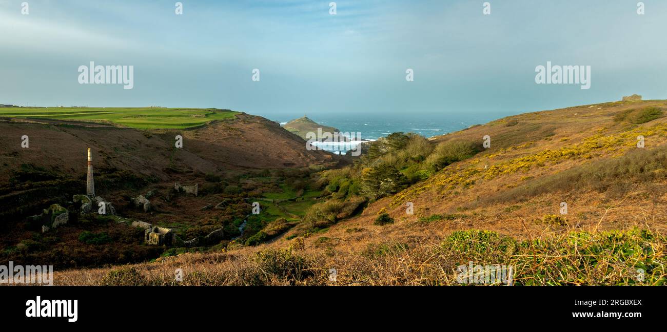 Panoramic View of Kenidjack Valley in West Cornwall That Runs Down to the Sea at Porthledden Cove, to the East of Cape Cornwall, Showing the Cape, the Heinz Monument and Mine Workings in the Valley. Stock Photo