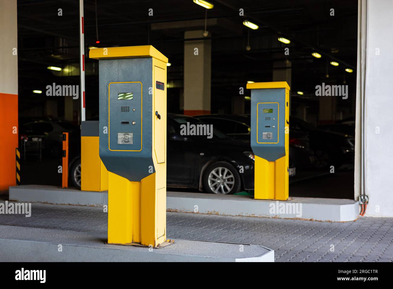 yellow parking meter in the car park. old validator in the car park