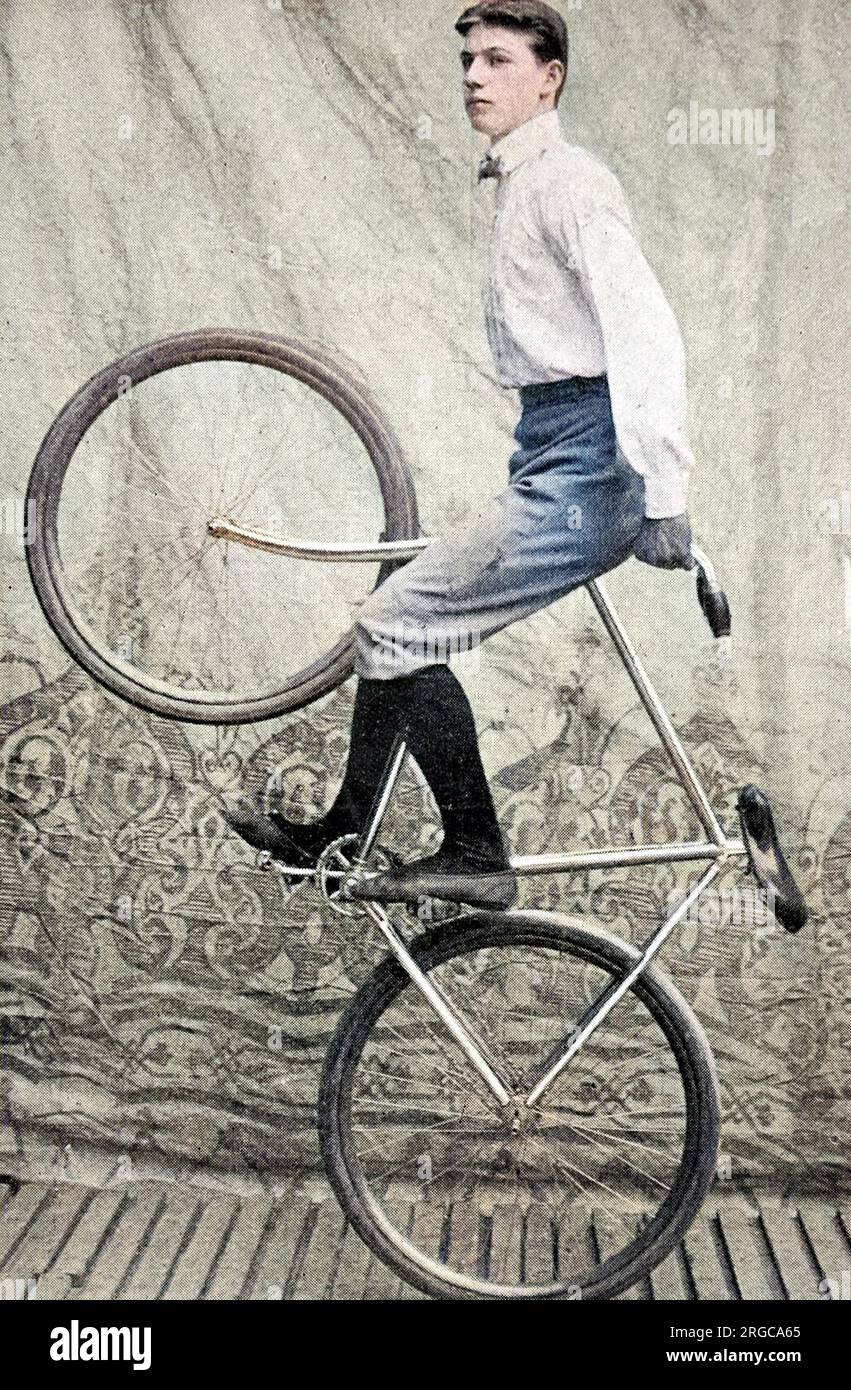 One of the Kaufmann troupe performing a bicycle trick at the London Hippodrome, September 1901. Stock Photo