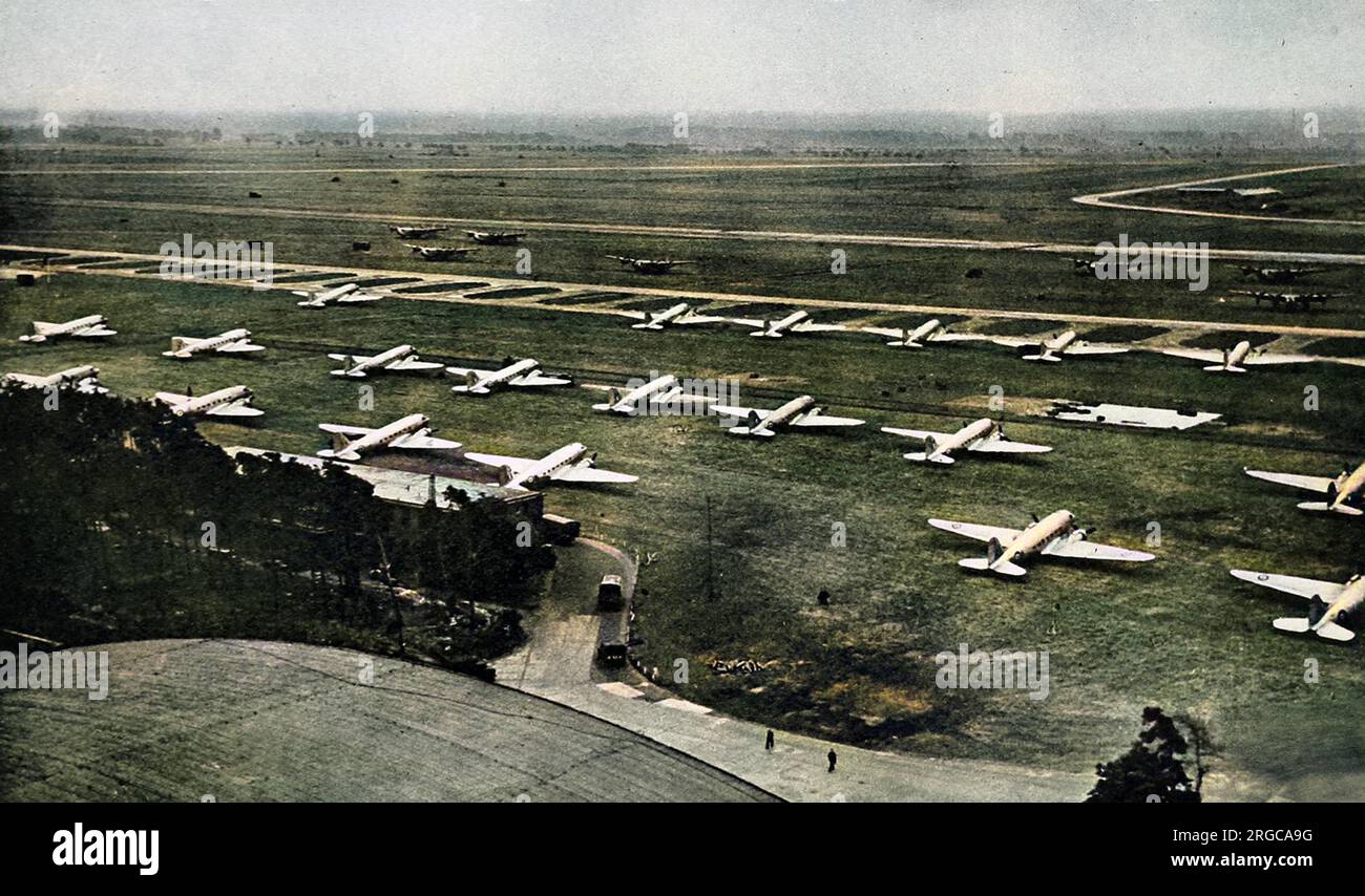 Photograph showing Wunstorf Airfield, near Hanover, in the British controlled zone of Germany, with a large number of 'Dakota' and 'York' airplanes lined up for use during the 'Berlin Airlift', 1948.  Between April 1948 and May 1949 Stalin, leader of the USSR, imposed a land blockade on supplies from Western Europe to West Berlin. In response the British and American governments organised an enormous airlift to supply food and other essentials to the 2.5 million inhabitants of West Berlin. After a year Stalin conceded defeat and lifted the land blockade. Stock Photo