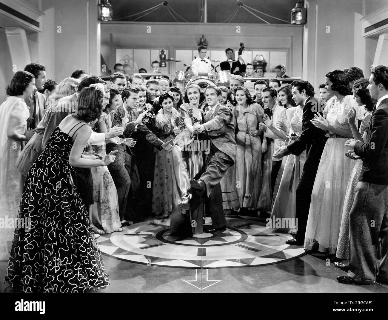 Jackie Cooper (playing drums), Tommy Wonder (clapping left), Buddy Pepper (dancing), on-set of the Film, 'Gangster's Boy', Monogram Pictures, 1938 Stock Photo