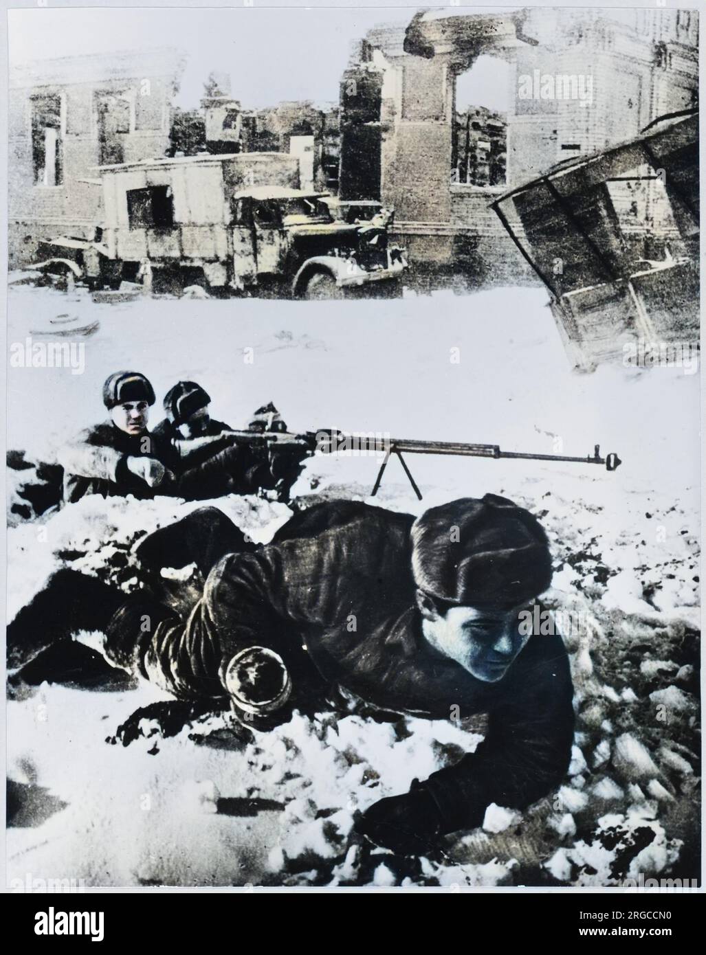 Red Army soldies lie in wait amongst the ruins Stock Photo