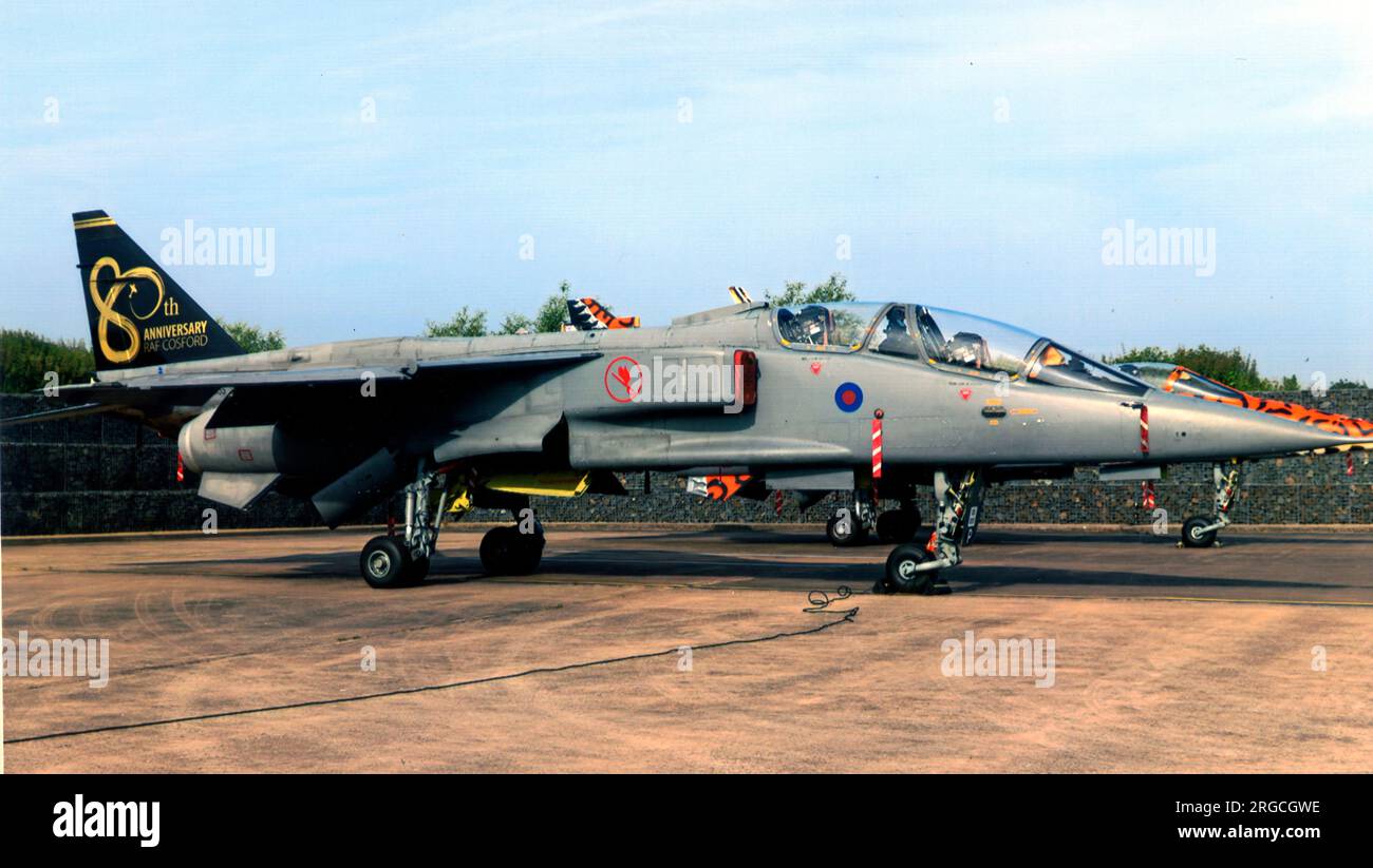 Royal Air Force - SEPECAT Jaguar GR.1 XX766 (msn S.63), of No.6 Squadron, at RAF Coltishall, fitted with tandem beams on the inboard pylons, loaded with four inert 1000lb bombs and countermeasures pods. Stock Photo