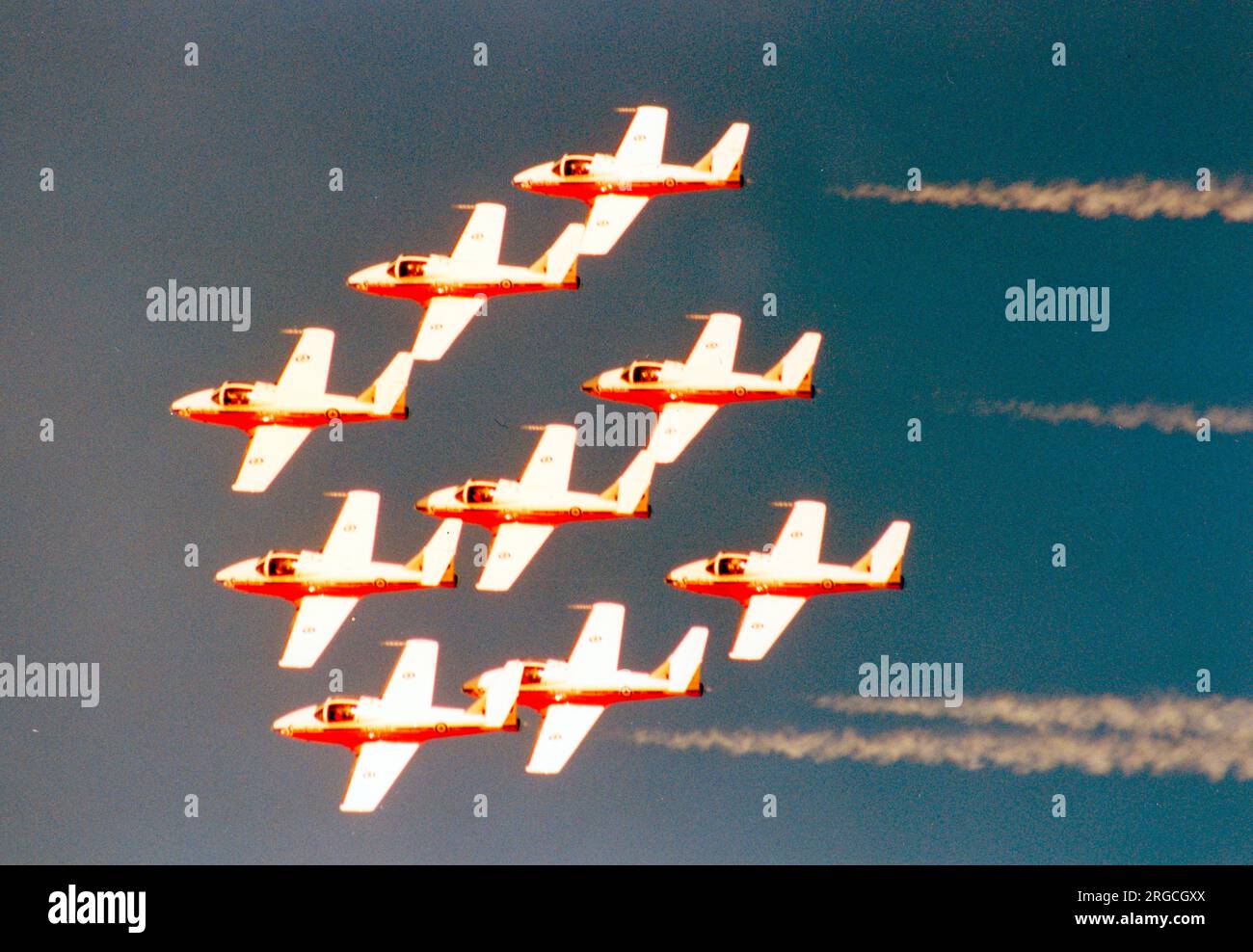 Canadian Armed Forces - Canadair CT-114 Tutors of the Snowbirds formation aerobatic team, at the Nellis Air Force Base '50th Anniversary of the USAF' airshow on 26 April 1997. Stock Photo