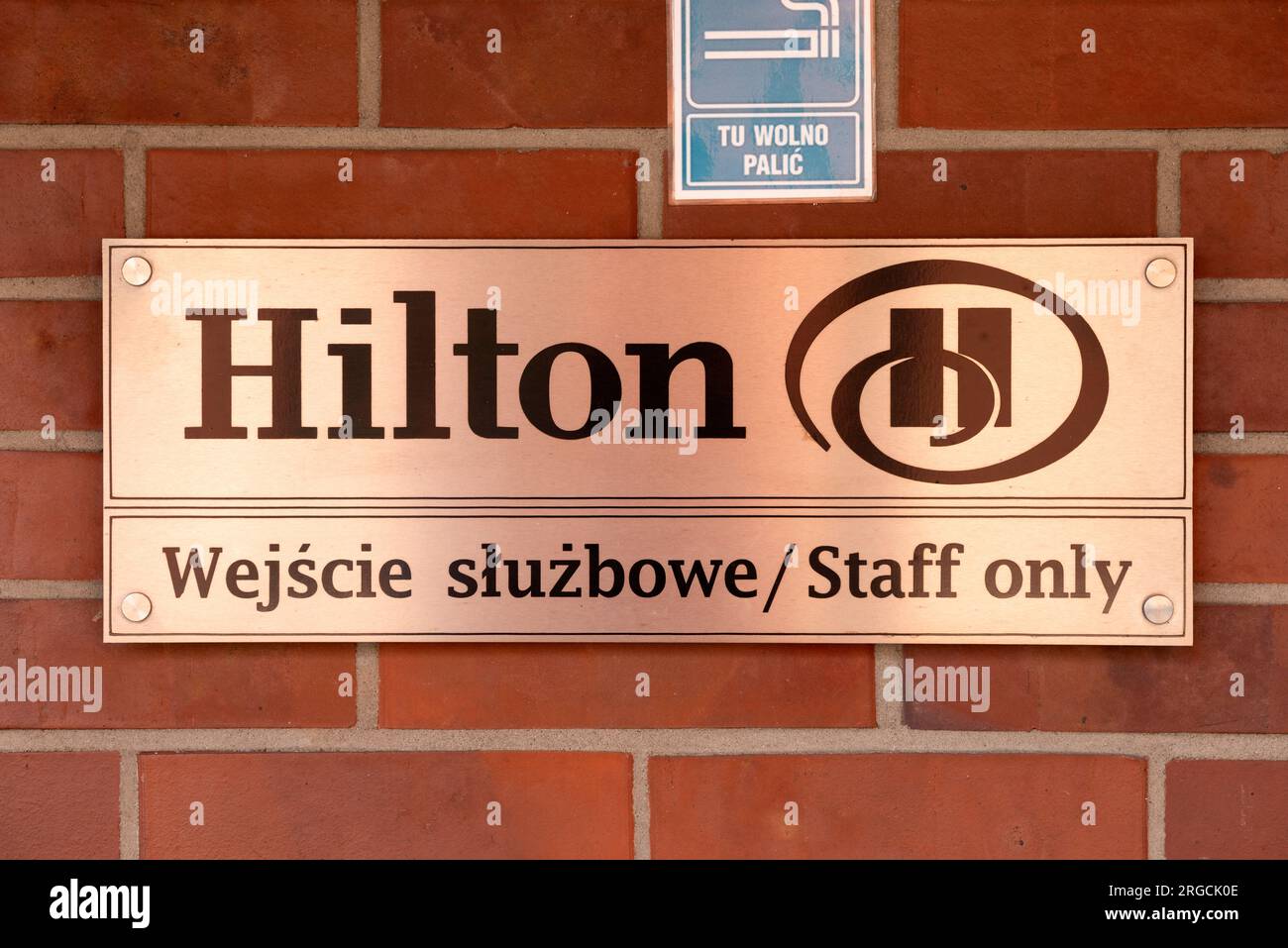 Hilton Hotel staff only bilingual sign in English and Polish in the Old Town of Gdansk, Poland, Europe, EU Stock Photo