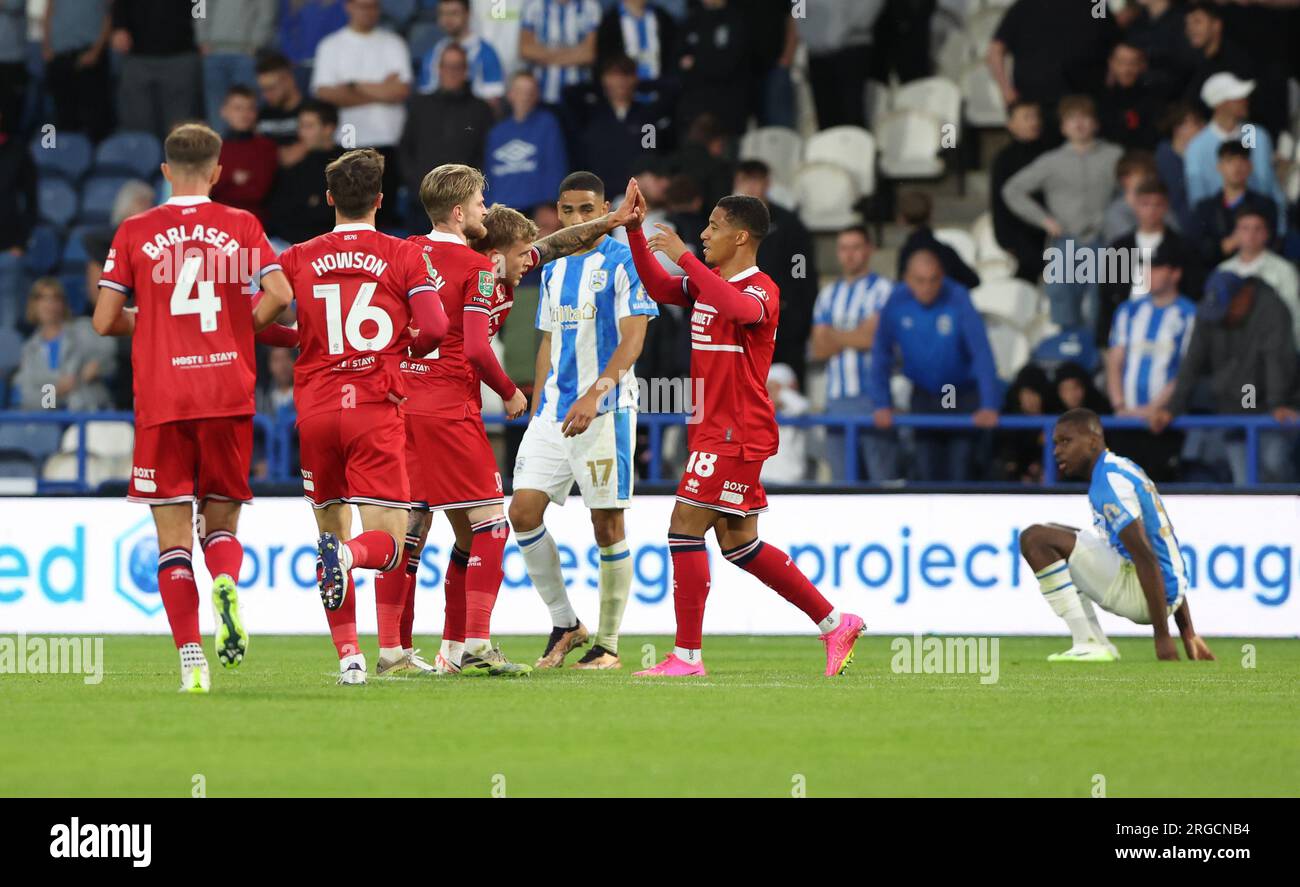 Riley McGree of Middlesbrough (C) celebrates scoring with teammates during the Carabao Cup match Huddersfield Town vs Middlesbrough at John Smith's Stadium, Huddersfield, United Kingdom, 8th August 2023  (Photo by Nigel Roddis/News Images) Stock Photo