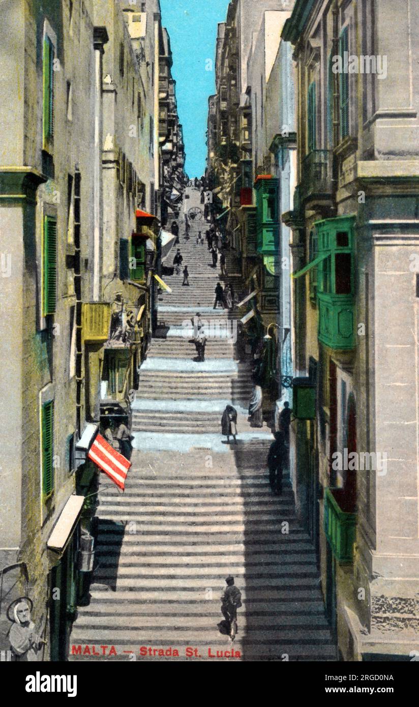 Strada St. Lucia, Valletta, Malta - one of the seven streets which horizontally crosses straight through The City from Harbour to Harbour. Stock Photo