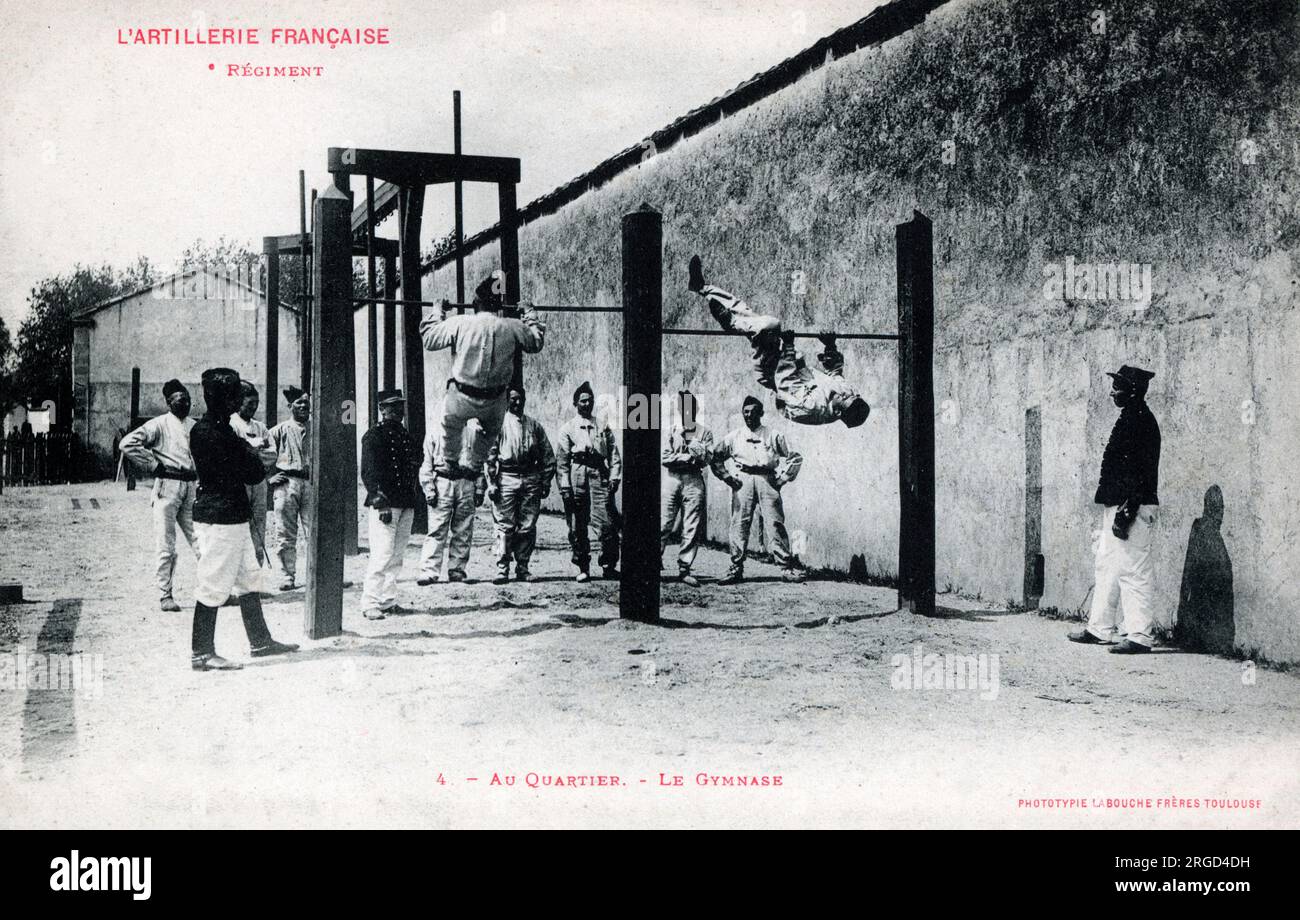French Artillery Regiment in Training - Gymnastics on the high bars. Stock Photo