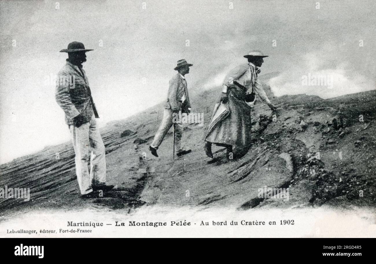 Martinique - Mount Pelee - (possibly rather unwise) tourists on the edge of the Volcano Crater. Stock Photo
