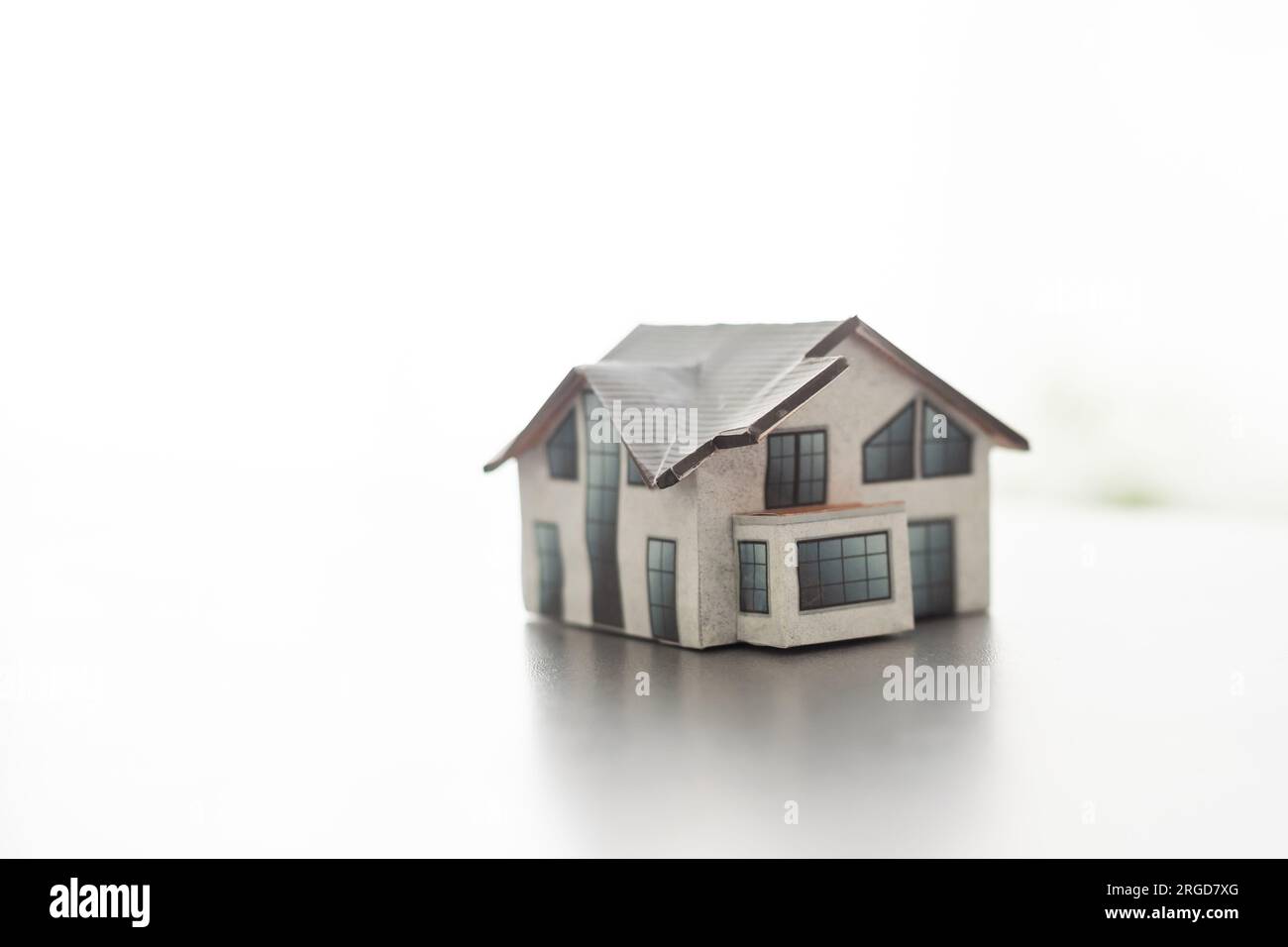 Small model of house on the background Stock Photo - Alamy