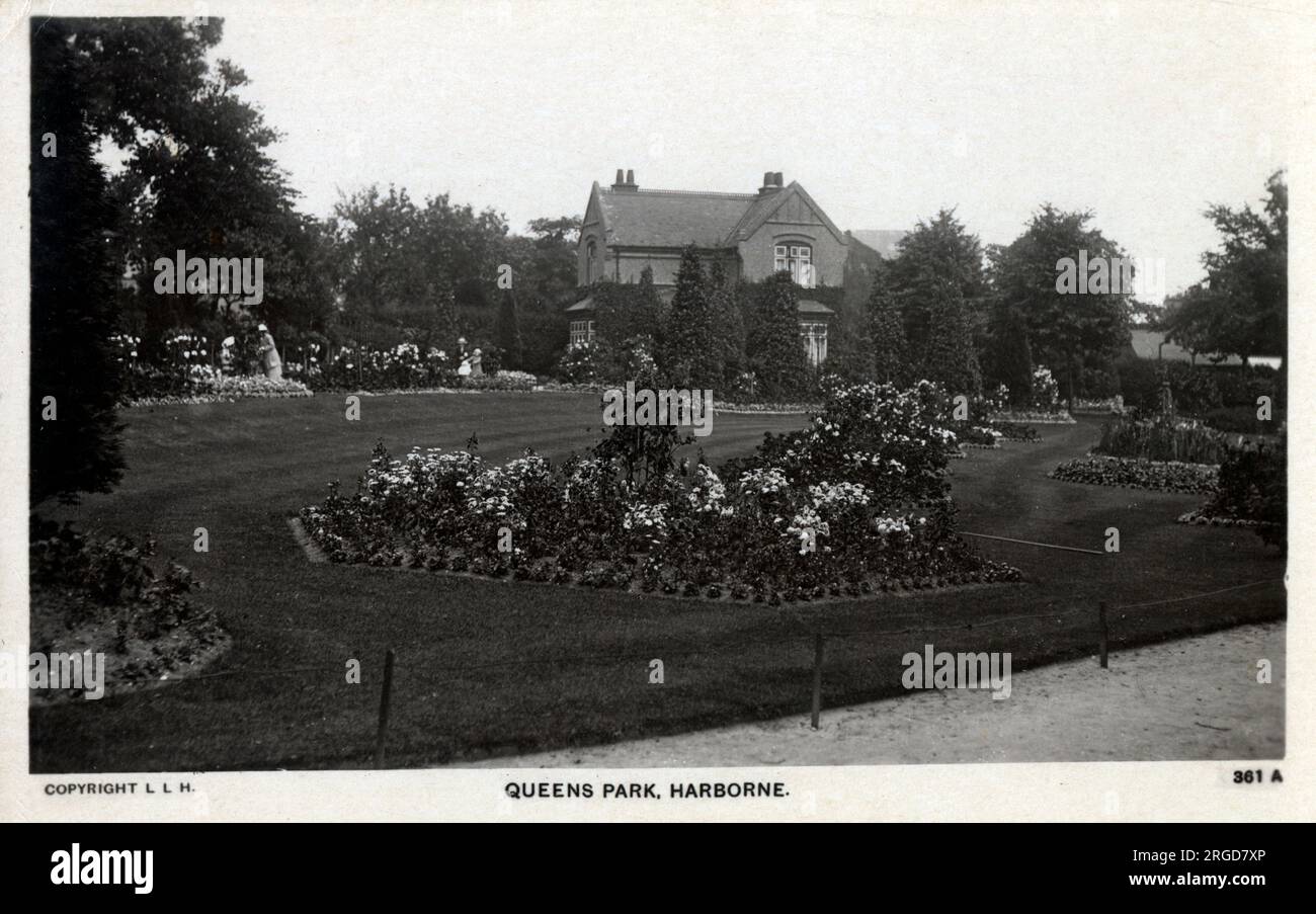 Flowerbeds at Queens Park, Harborne, south-west Birmingham - in the distance is 'The Grove' home of Birmingham's first MP, Thomas Attwood. Stock Photo