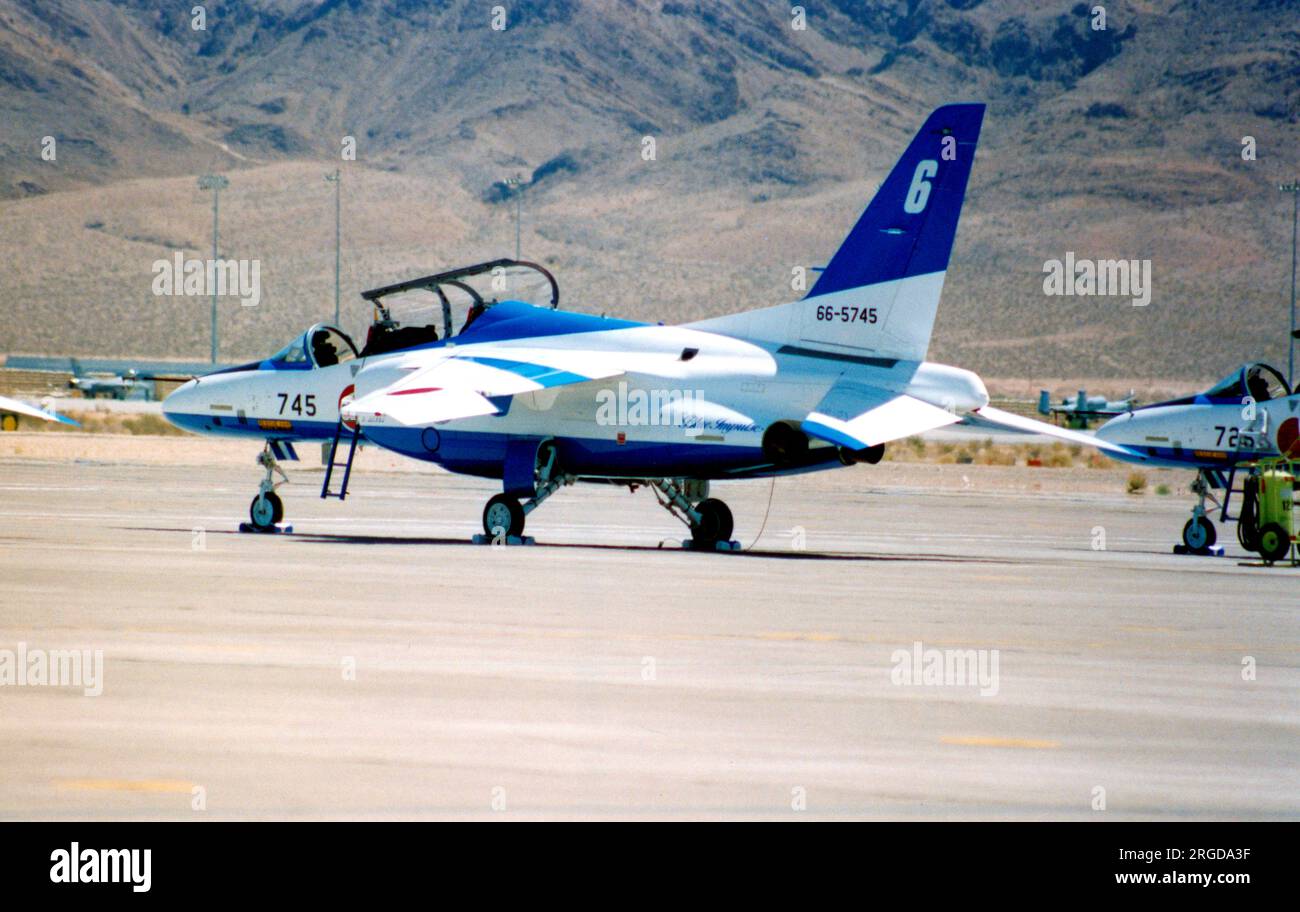 Japan Air Self Defence Force - Kawasaki T-4 66-5745 / number 6 (msn 1145), of the Blue Impulse aerobatic display team, at the Nellis Air Force Base '50th Anniversary of the USAF' airshow on 26 April 1997. Stock Photo