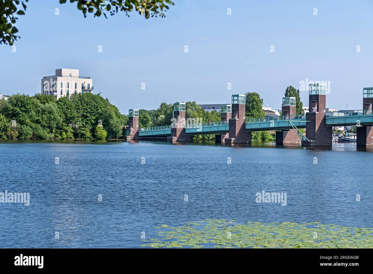 Berlin, Germany - June 13, 2023: Steel girder bridge Spandauer-See Bruecke over the River Havel connects the parts of the Wasserstadt Oberhavel, which Stock Photo