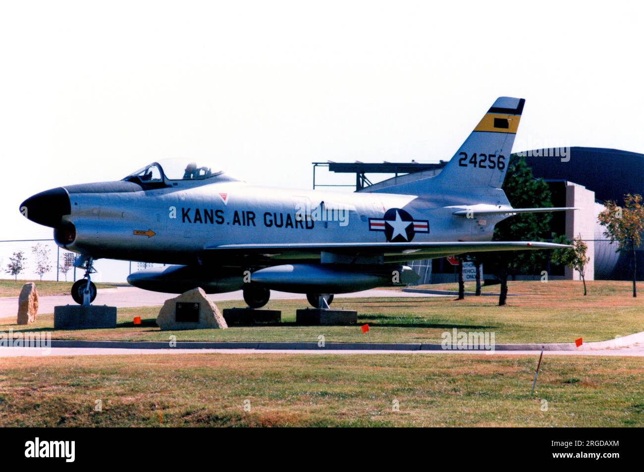 North American F-86L Sabre 52-4256 (MSN 190-659), on plinths at McConnell AFB, KS. Stock Photo