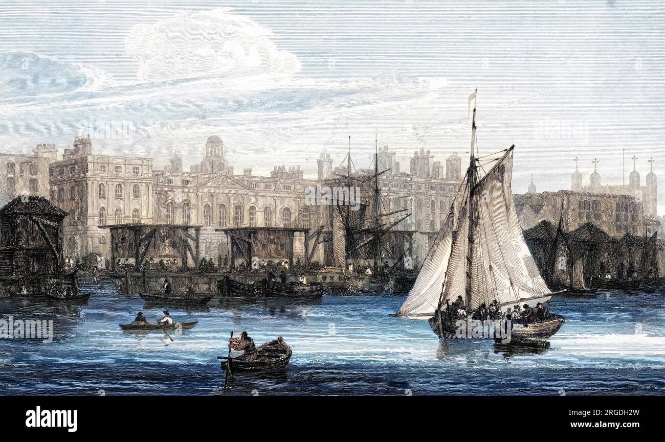 The old Custom House, fronting the Thames, viewed from the south bank of the river : the building is destroyed by fire this year, and has to be completely rebuilt. Stock Photo