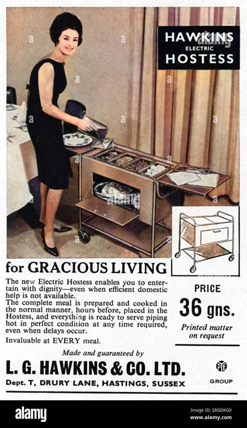 Advertisement for the Hawkins Electric Hostess Trolley 'for gracious living', enabling you to entertain with dignity 'even when domestic help is not available'!  An elegant hostess is pictured serving a pre-prepared meal to her guests from the trolley, where everything is kept warm for stress-free dinner party entertaining, sixties style! Stock Photo