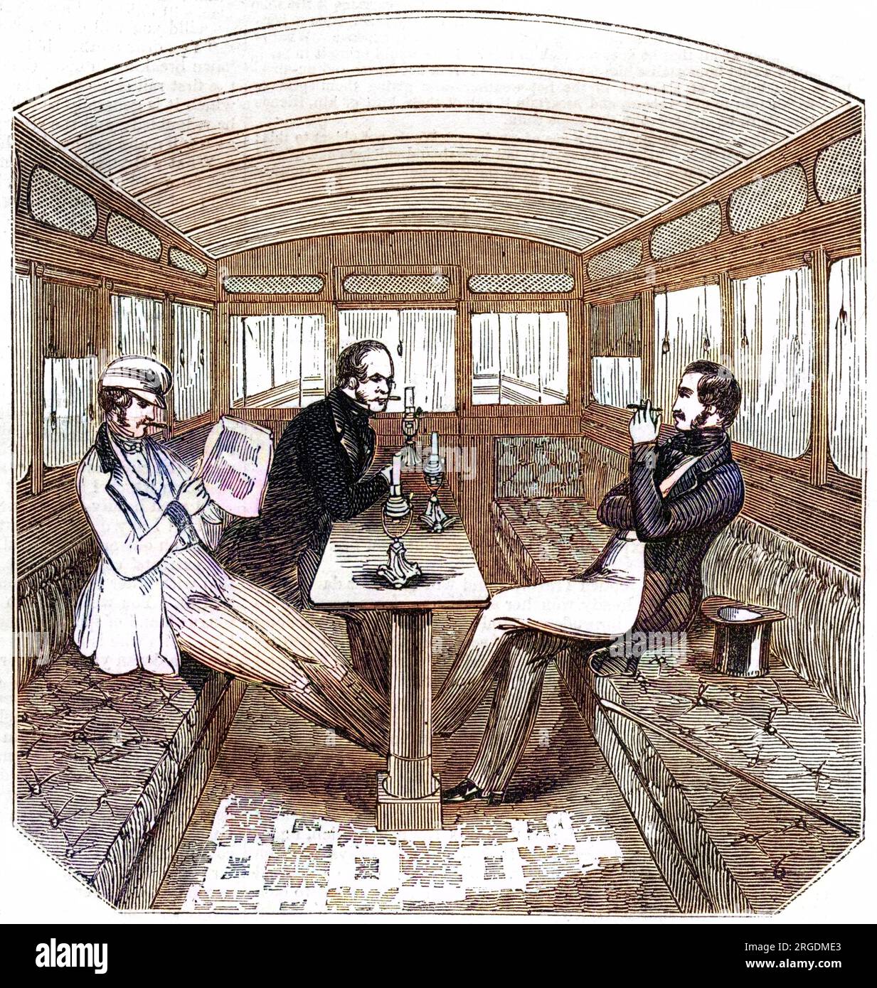 The interior of a smoking saloon on the Eastern Counties Railway. The couches on either side were of blue morocco and the centre table of polished mahogany. Stock Photo