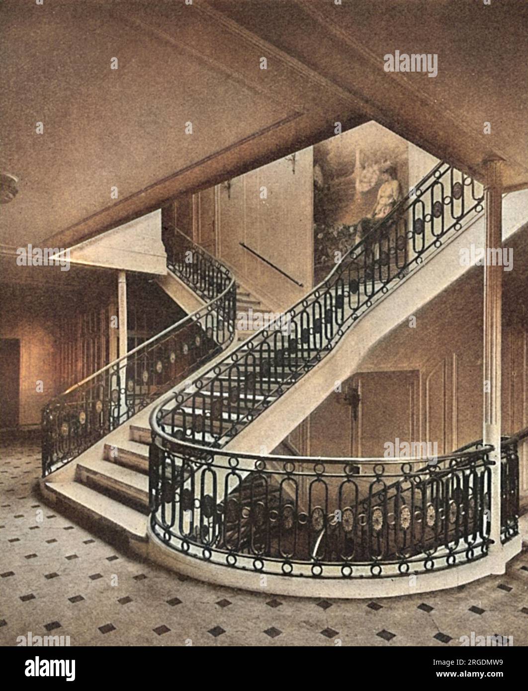The luxurious main staircase of the German steamship 'Amerika' of the Hamburg-America Line, as decorated in the Adams' style by Waring and Gillow Limited. Pictured here in the year she was launched, in 1917 the Amerika would become USS America, following being commandeered by the Americans when they entered World War One. Stock Photo