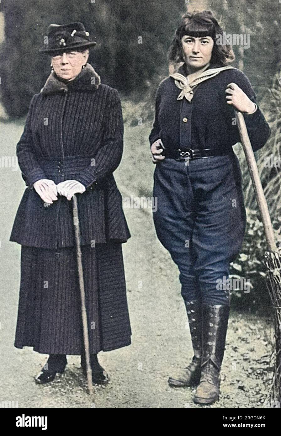 https://c8.alamy.com/comp/2RGDN6K/lady-cowdray-a-strong-supporter-of-the-womens-land-council-seen-with-one-of-the-many-lady-gardeners-who-was-employed-on-her-large-estate-at-cowdray-park-midhurst-during-the-first-world-war-the-sensible-work-dress-worn-by-the-girl-was-her-own-design-2RGDN6K.jpg
