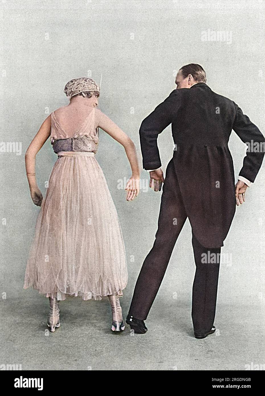 The Pigeon Walk, a new dance demonstrated by Peggy Kurton and George Grossmith in Tonight's the Night at the Gaiety Theatre in 1915.  The Pigeon Walk joined other popular animal-themed dance crazes such as the Grizzly Bear, the Bunny Hug and the Turkey Trot during the Great War period. Stock Photo