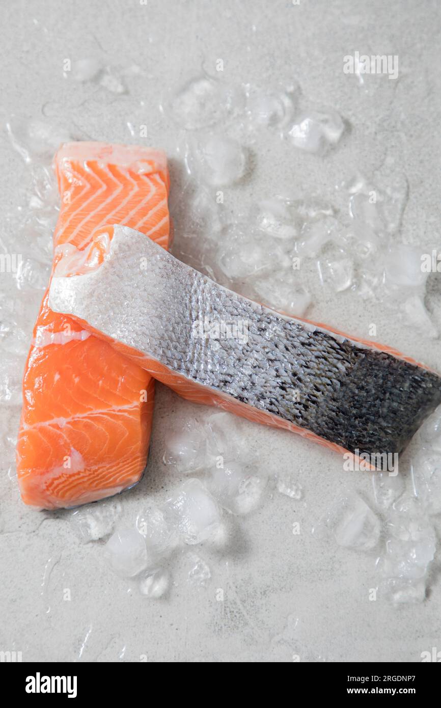 Fresh salmon steaks with skin on ice Stock Photo - Alamy