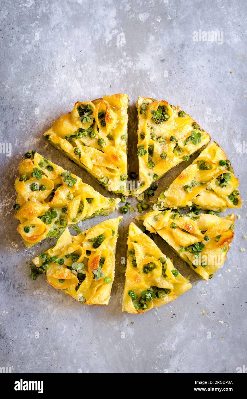 Pasta  Frittata on a marble background Stock Photo