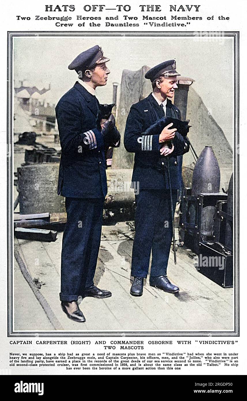 Vice-Admiral Alfred Carpenter VC (17 September 1881 – 27 December 1955) was a Royal Navy officer who was awarded the Victoria Cross for his command of HMS Vindictive during the Zeebrugge Raid on the night of 22/23 April 1918.  Pictured with Commander Osborne (on the left) holding the ship's mascots - two black cats. Stock Photo