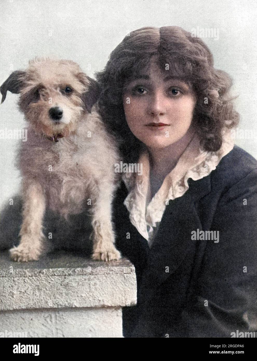 Miss Laurette Taylor (1883-1946) American actress born Loretta Helen Clooney. She appeared in one of the most popular shows of the First World War in London, Peg O' My Heart, written by her husband J Hartley Manners. Pictured with Michael, one of the canine stars of the show, who according to The Tatler went missing for a while but was soon returned. Stock Photo