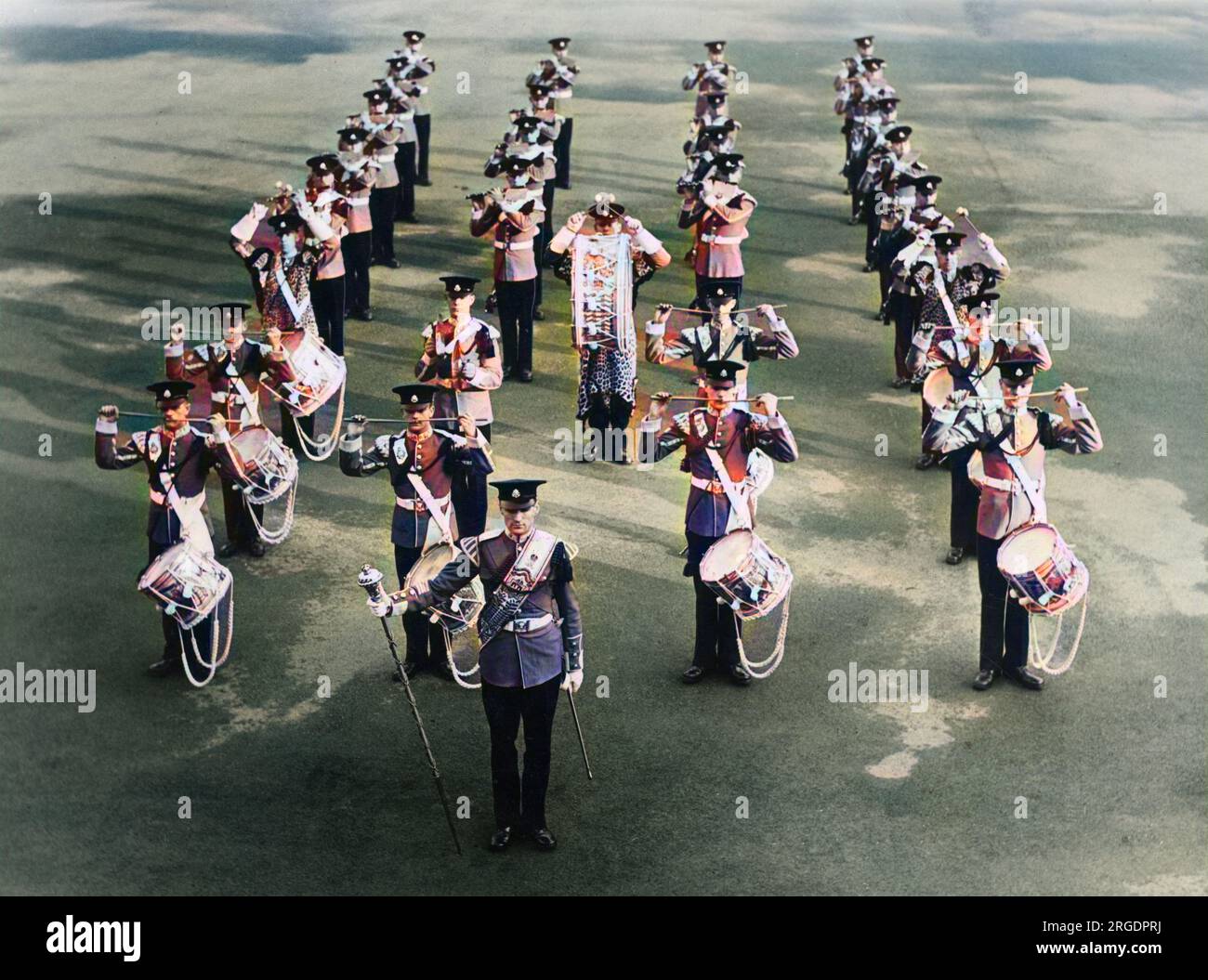 A military band on the parade ground, beating their drums. Stock Photo