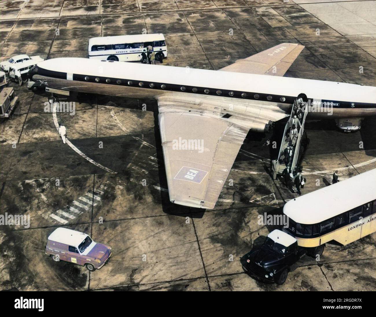 Passengers alighting from a British European Airways (BEA) Comet 4B plane at London Heathrow Airport, England. Stock Photo