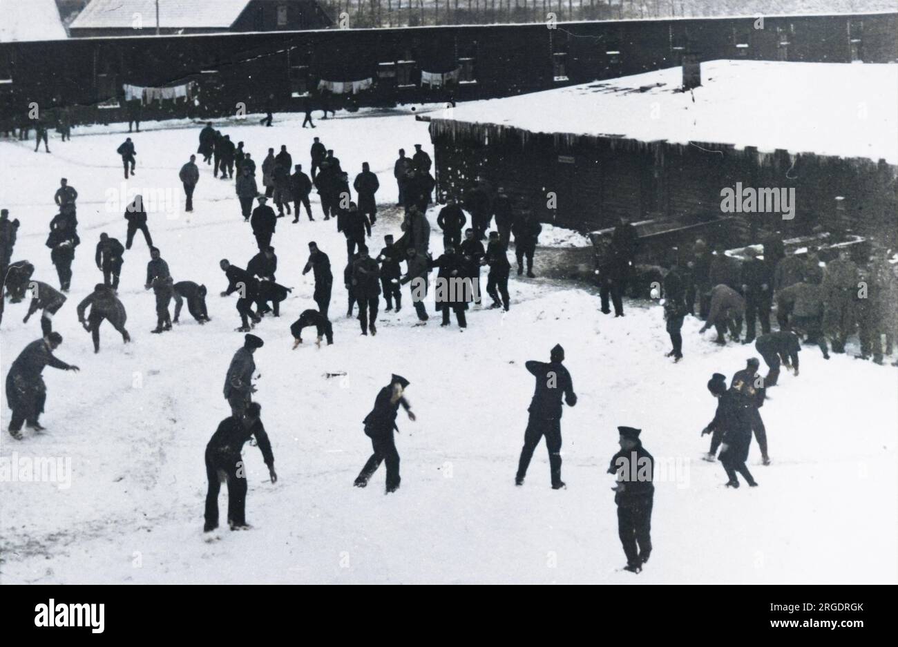 A snowball fight  between soldiers, somewhere behind the lines on the Western Front in France Stock Photo