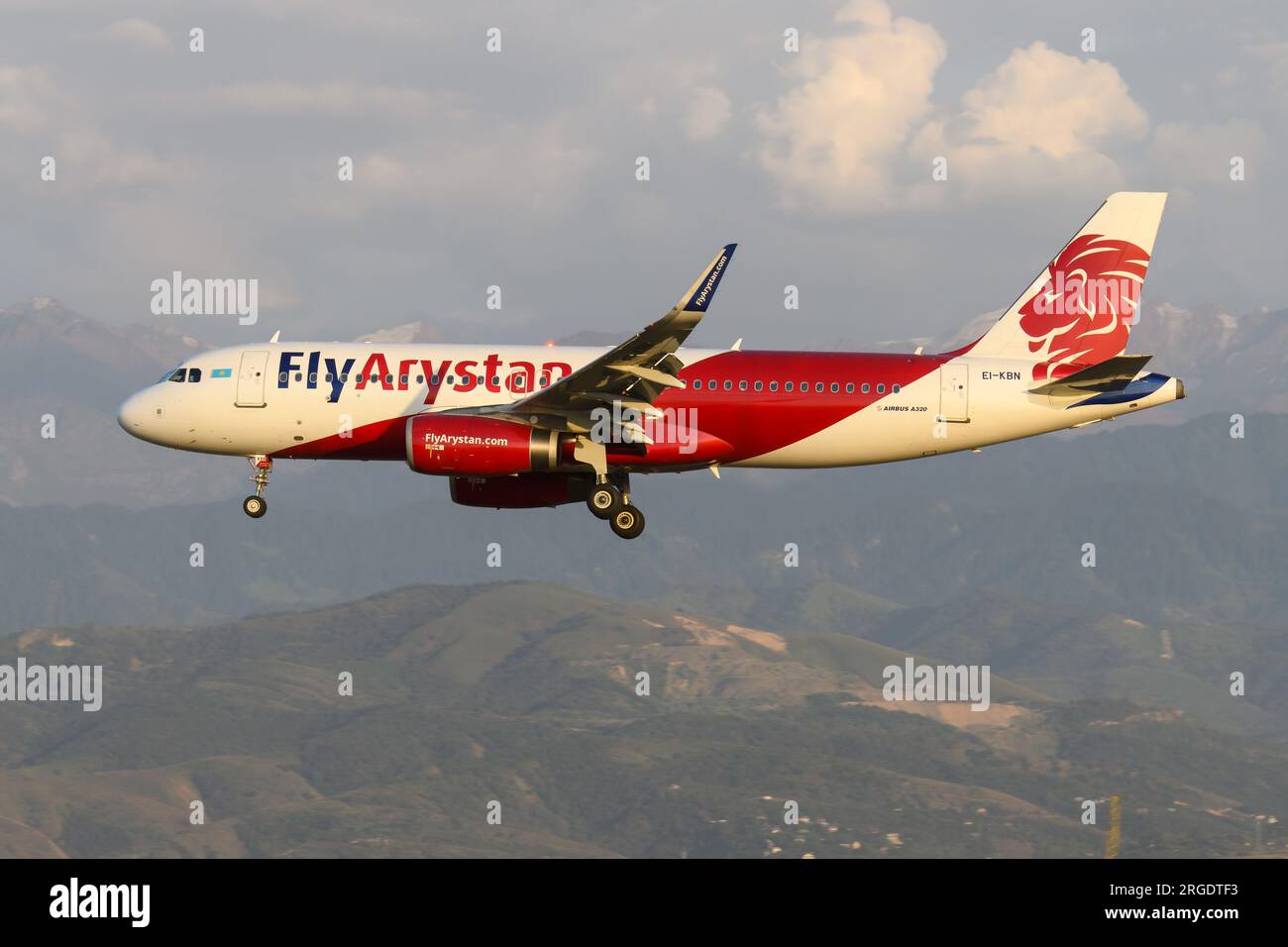 Fly Arystan Airbus A320 plane about to land in Almaty Airport in Kazakhstan. Aircraft A320 of FlyArystan. Airplane EI-KBN. Stock Photo