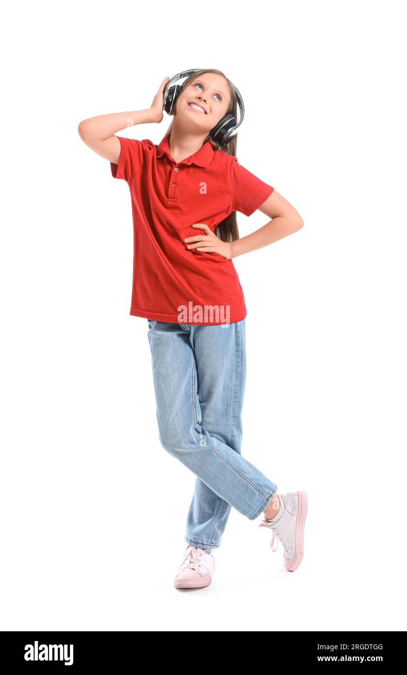 Little girl in headphones on white background Stock Photo - Alamy