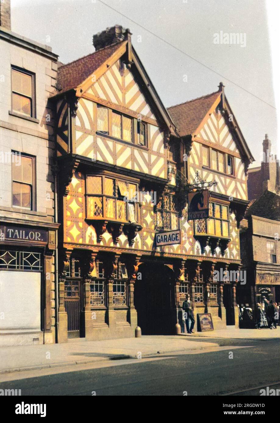 Street scene in an unidentified location, with the tudor-style Nag's ...