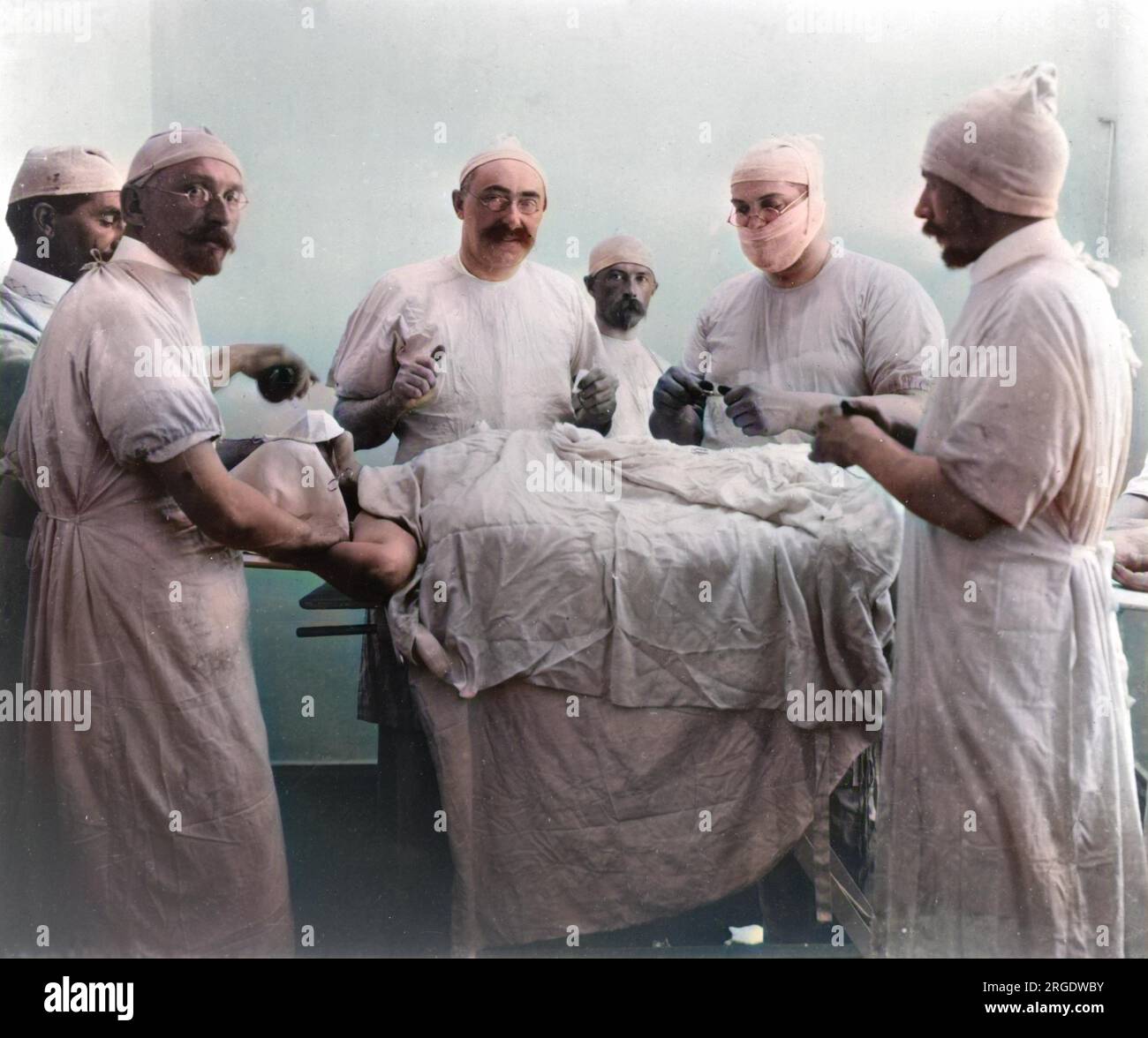 Six surgeons about to get to work in an early 20th century Russian Hospital. Stock Photo