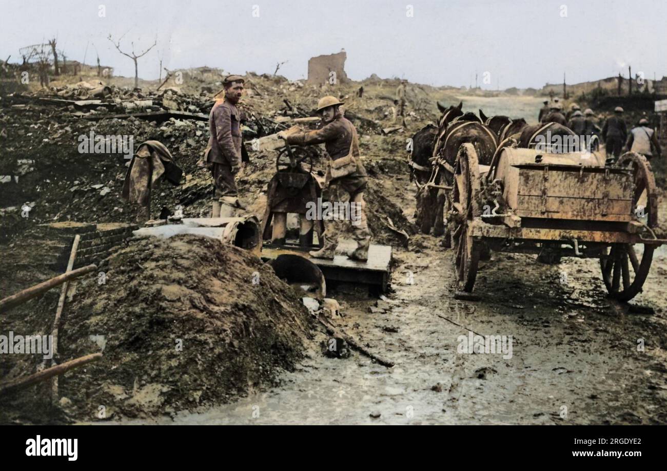 British soldiers drawing water in a captured village on the Western Front during World War One. Stock Photo