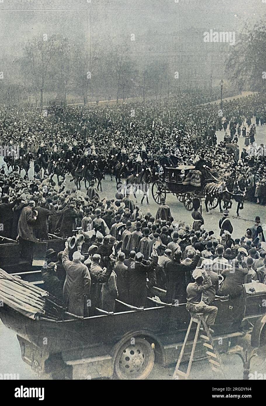 Vast crowds in Horse Guards' Parade watching the bridegroom, Prince Albert, Duke of York and his brothers, the Prince of Wales and Prince Henry (Duke of Gloucester) driving in procession to Westminster Abbey for the Duke of York's marriage to Lady Elizabeth Bowes-Lyon in April 1923. Stock Photo
