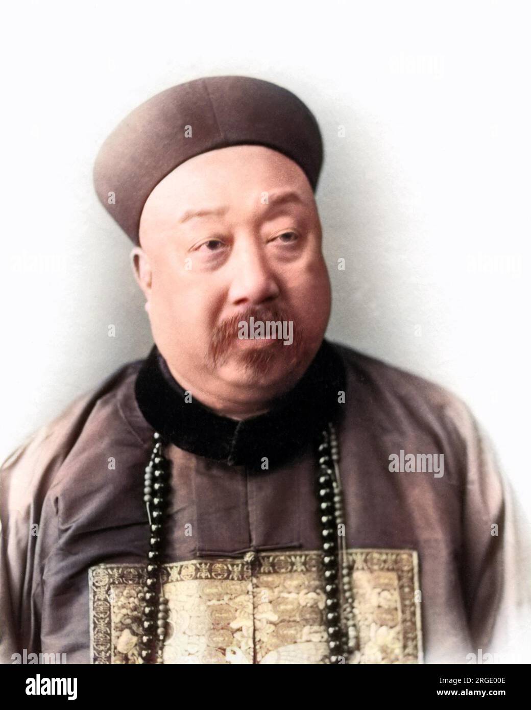 A Chinese man in traditional costume Stock Photo - Alamy