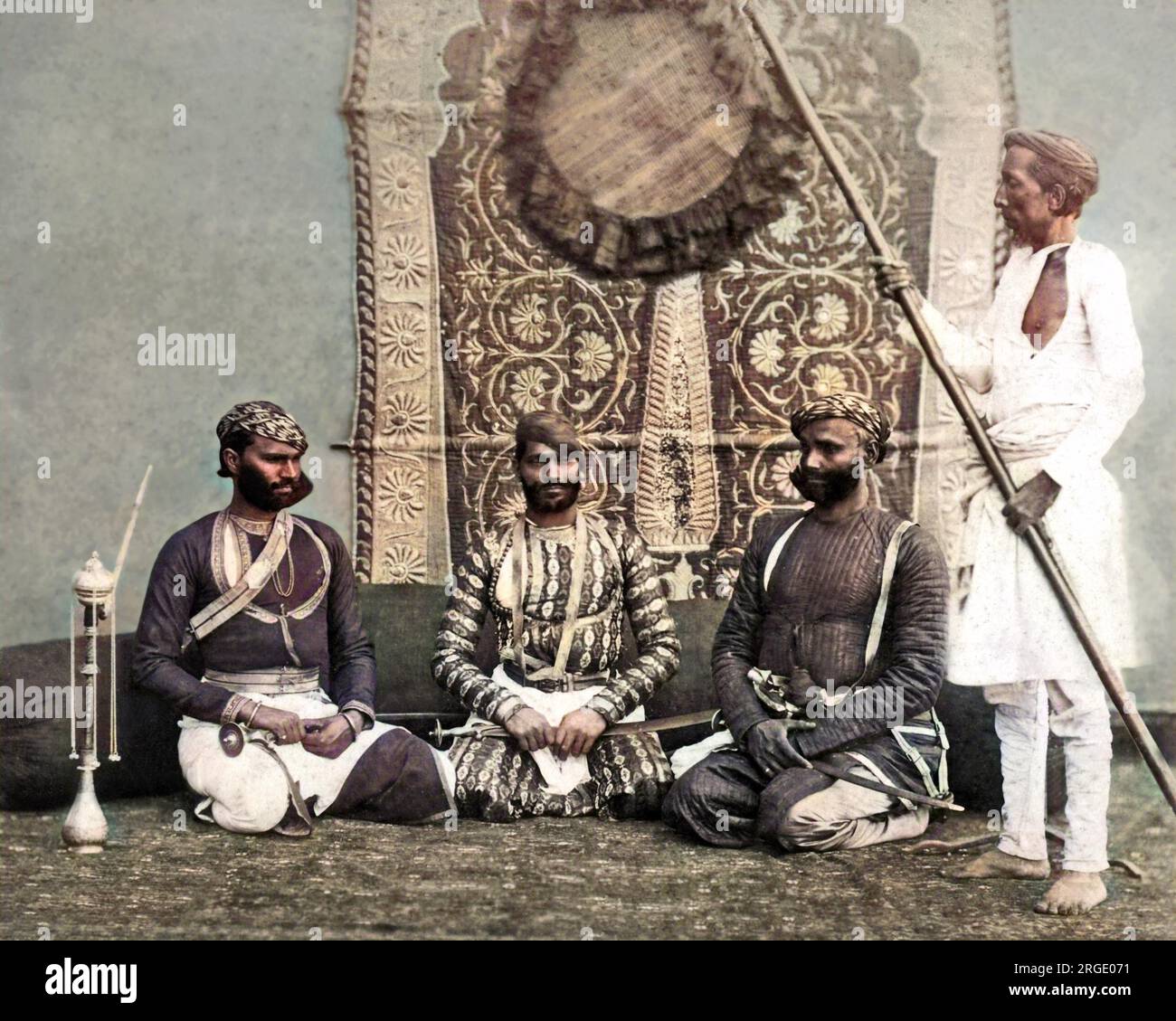 Three Jat Sirdars (Sikh leaders) with attendant, India Stock Photo Alamy