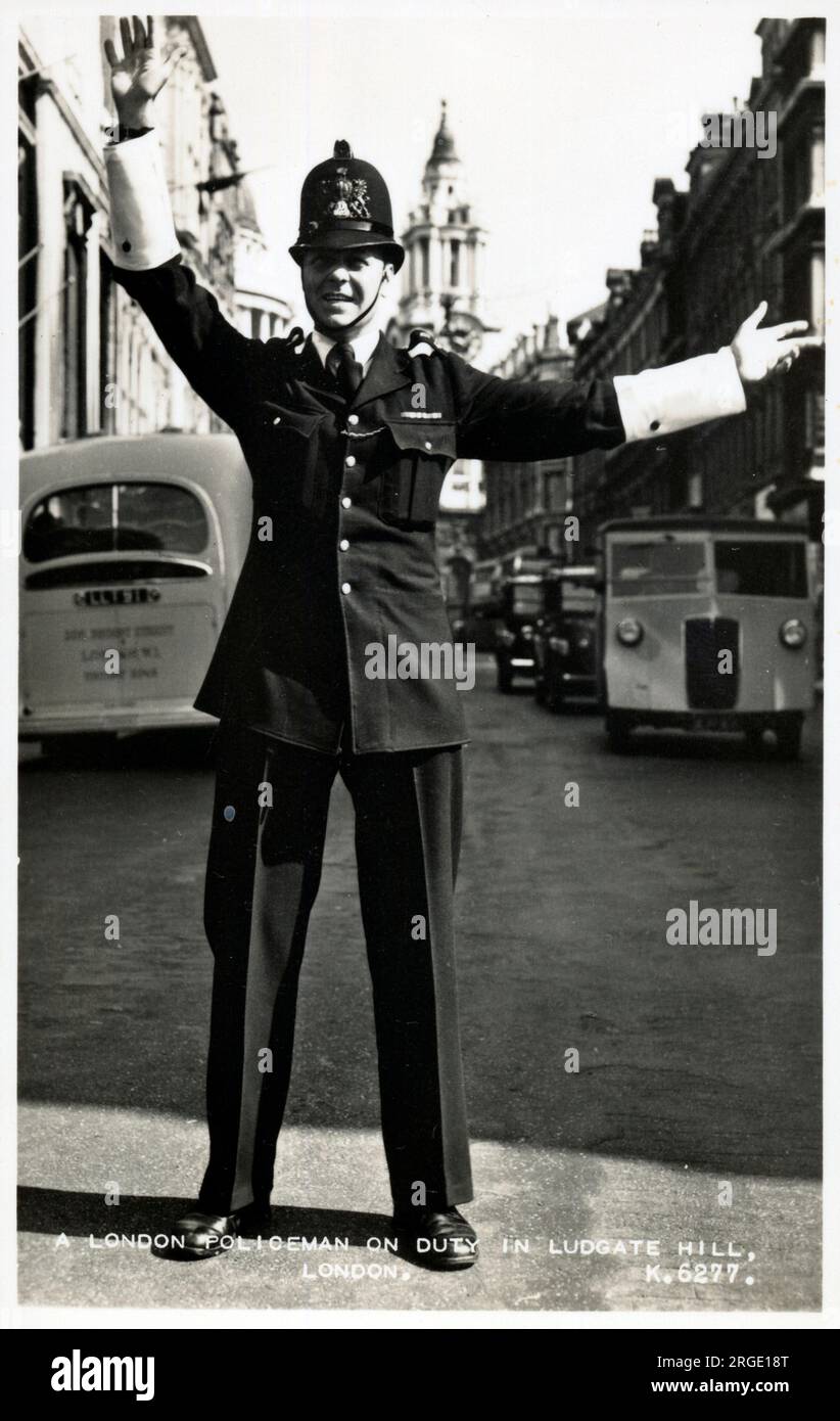 A Policeman on traffic duty - Ludgate Hill, London Stock Photo