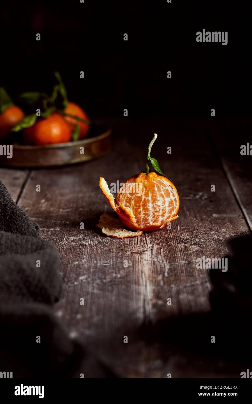 Clementines on a wooden table Stock Photo